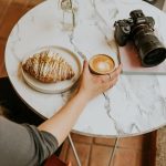 Cozy Café Scene with Coffee and Croissant