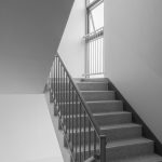 A black and white photo of a staircase