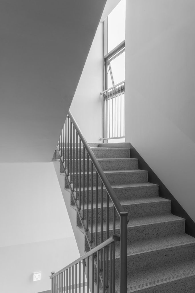 A black and white photo of a staircase