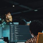 boy in front of computer monitor